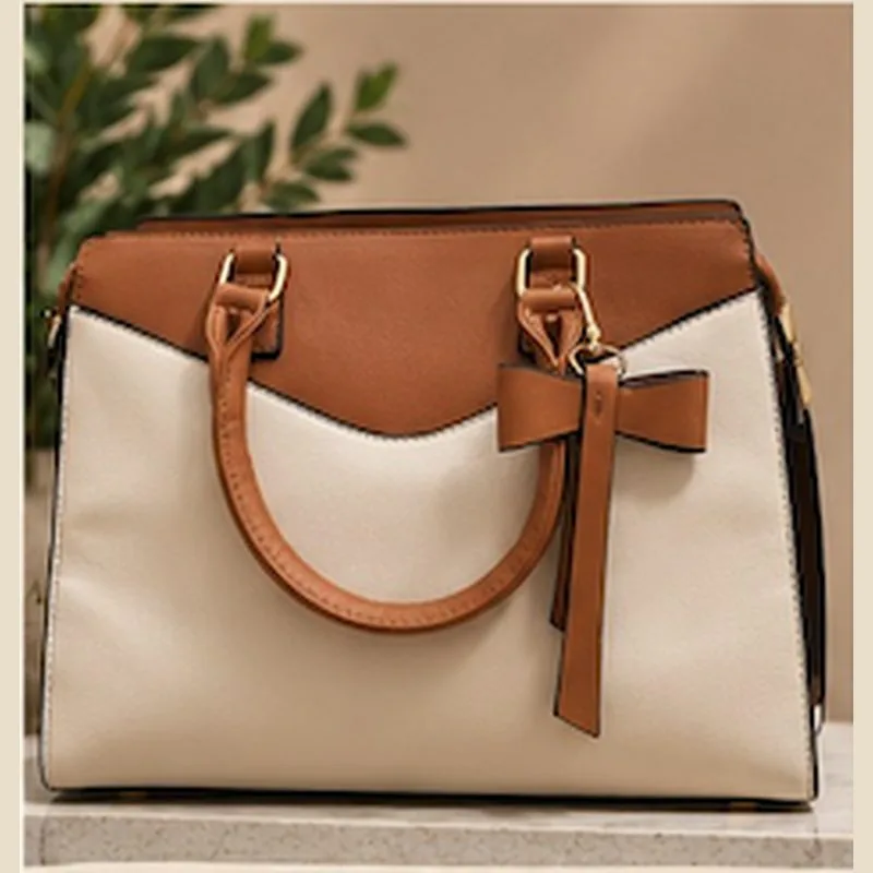 Bolso bicolor con lazo